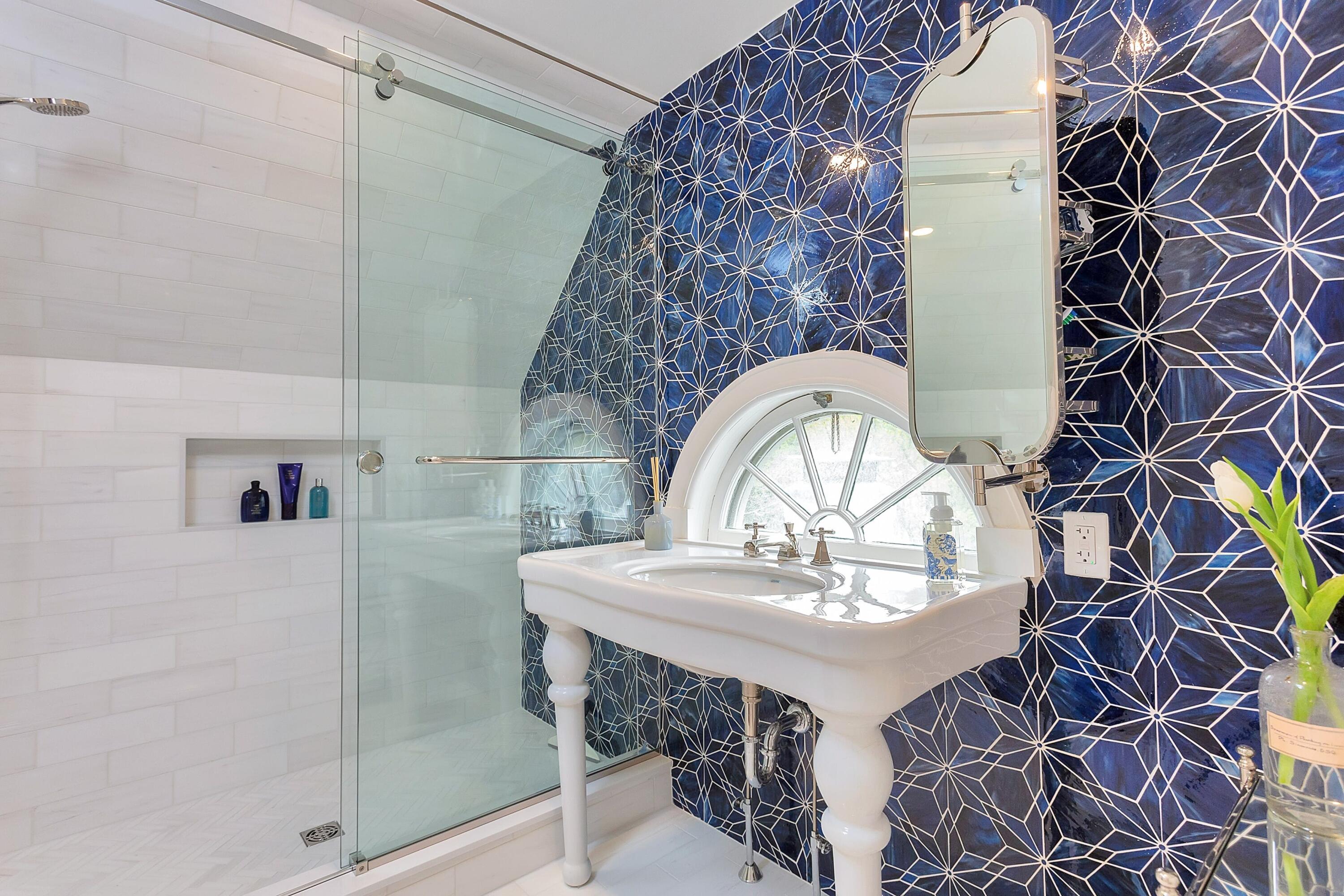 343-335 Wahackme Road New Canaan, CT 06840 - Photo 22 of 32 a bathroom with a sink and mirror
