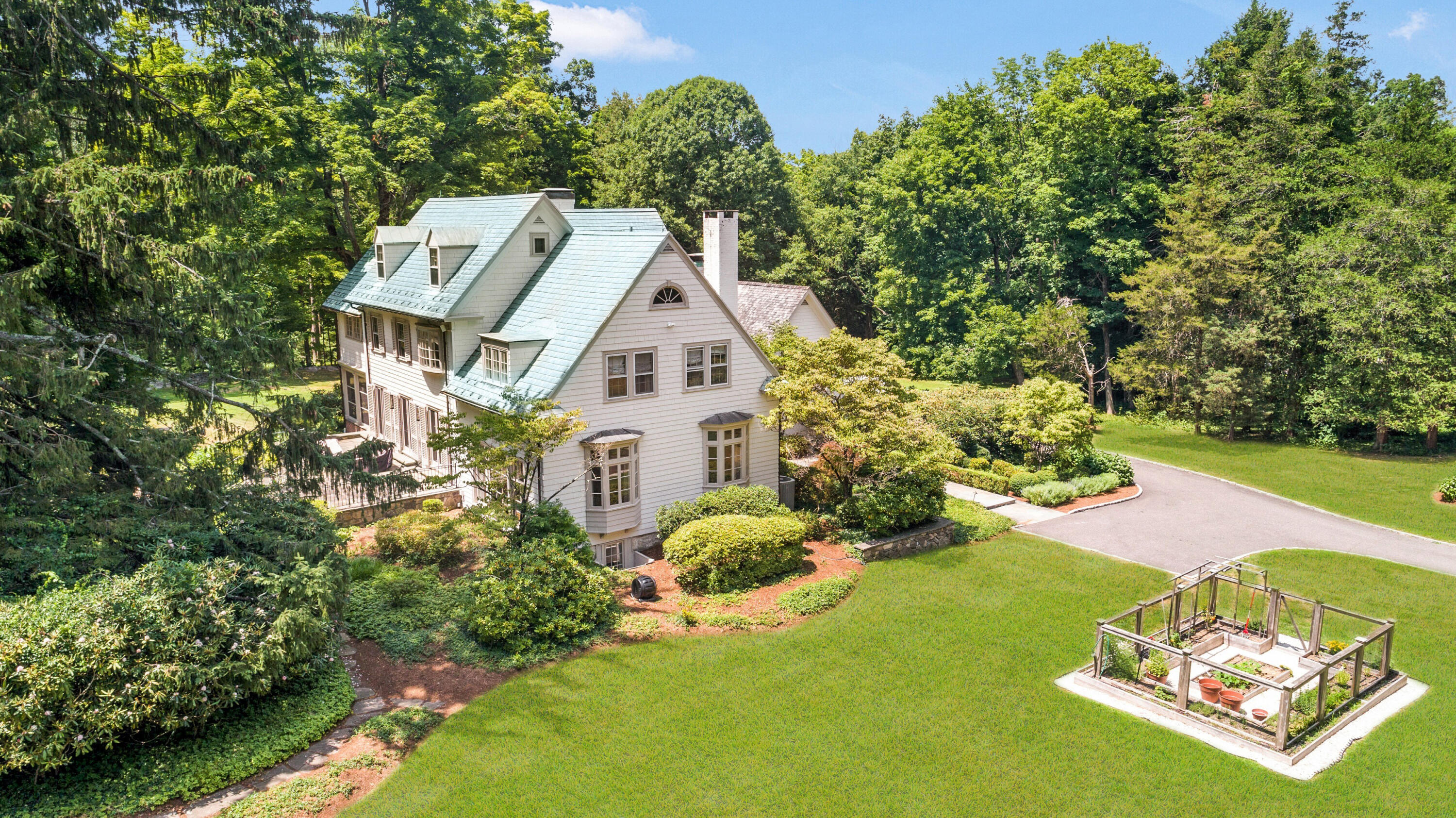 343-335 Wahackme Road New Canaan, CT 06840 - Photo 26 of 32 an aerial view of a house with yard swimming pool and outdoor seating