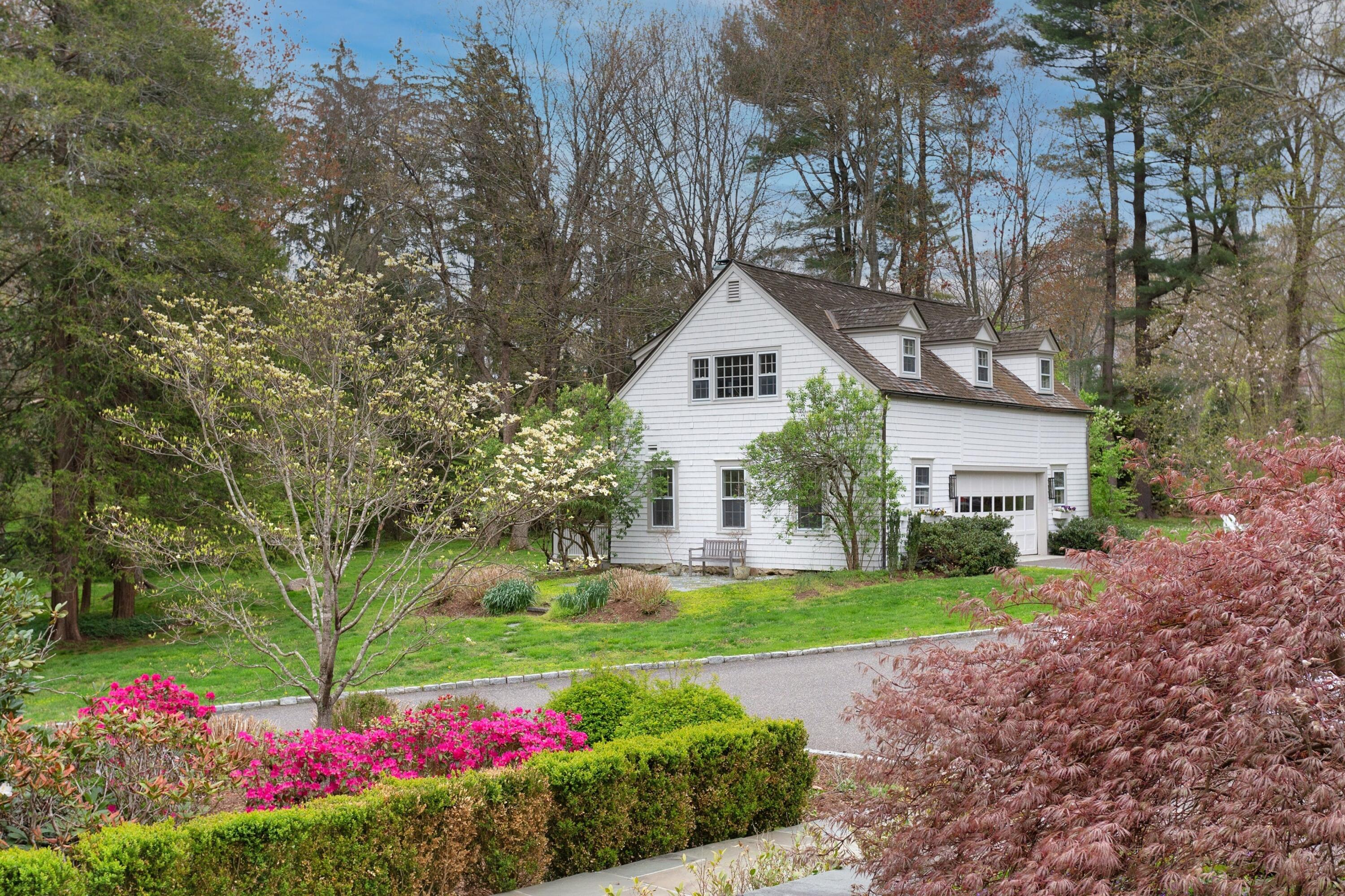 343-335 Wahackme Road New Canaan, CT 06840 - Photo 27 of 32 a house view with a outdoor space
