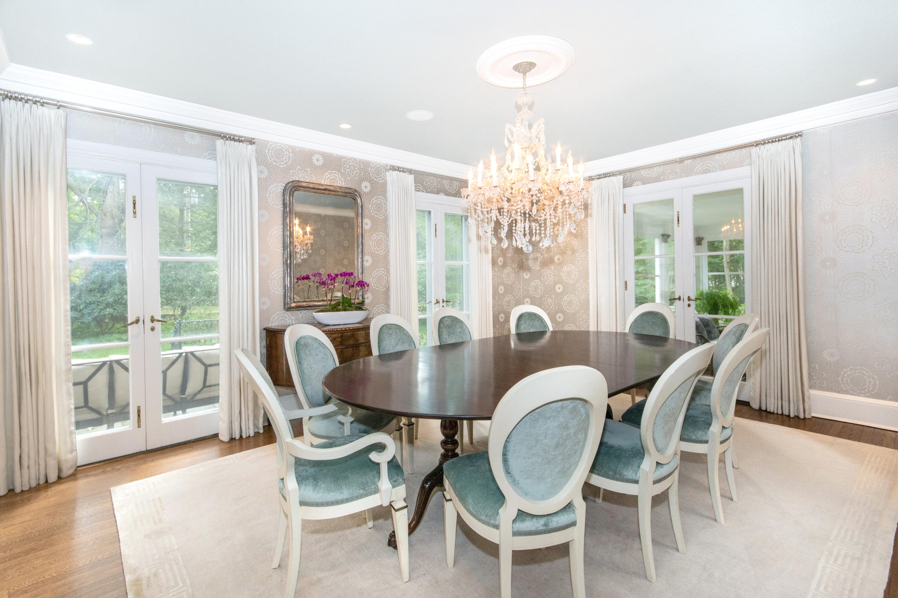 343-335 Wahackme Road New Canaan, CT 06840 - Photo 5 of 32 a dining room with furniture a large window and wooden floor