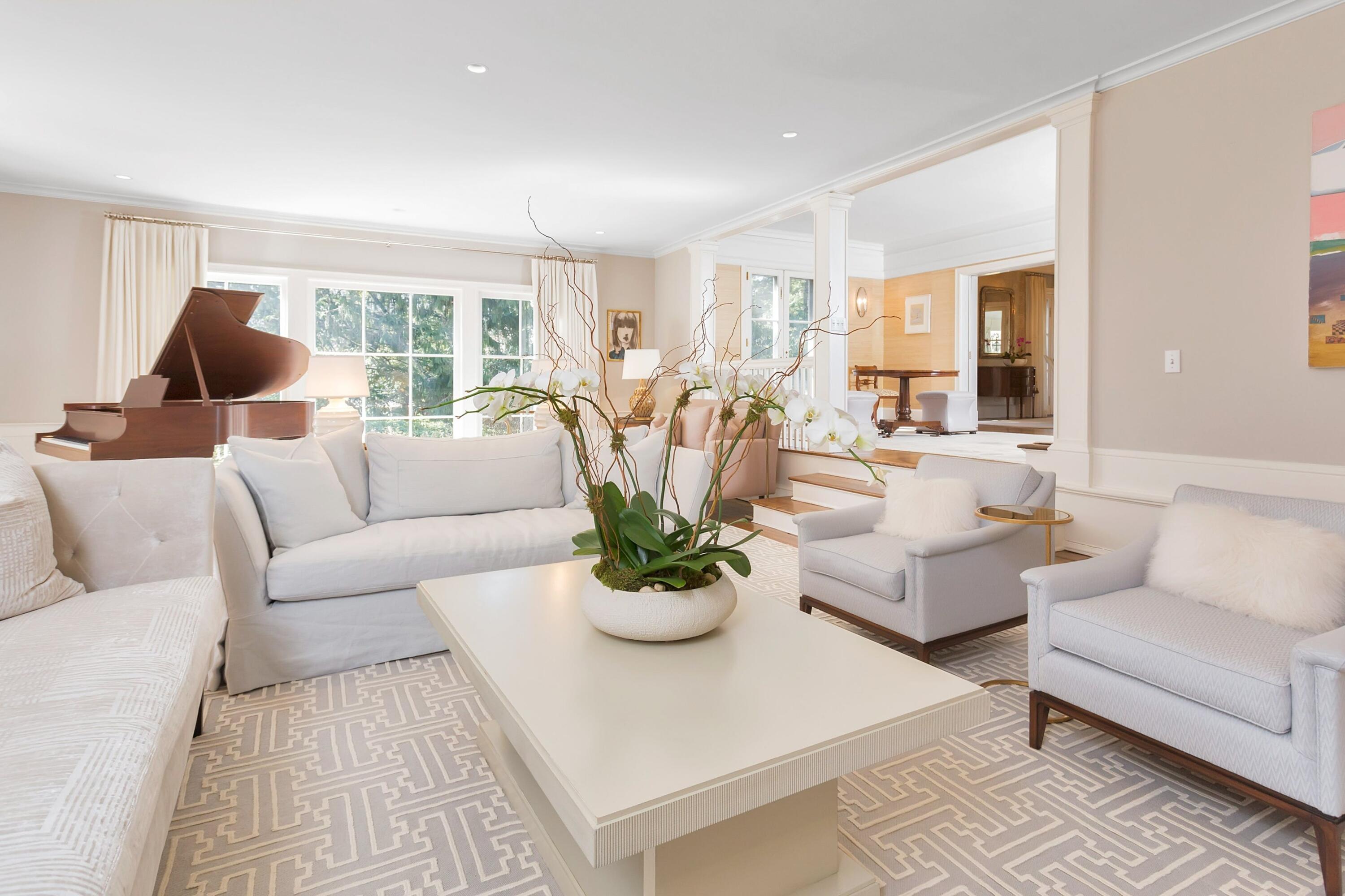 343-335 Wahackme Road New Canaan, CT 06840 - Photo 7 of 32 a living room with furniture white walls and a large window
