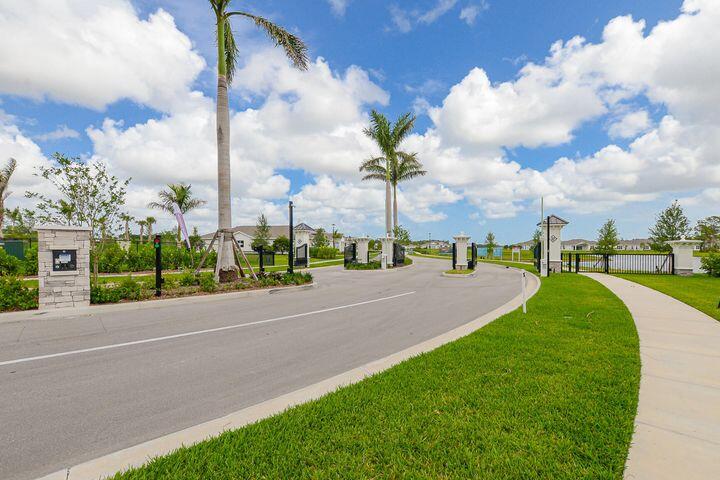 10307 Dreamweaver Road Port St. Lucie, FL 34987 - Photo 54 of 55 Four Seasons Entrance