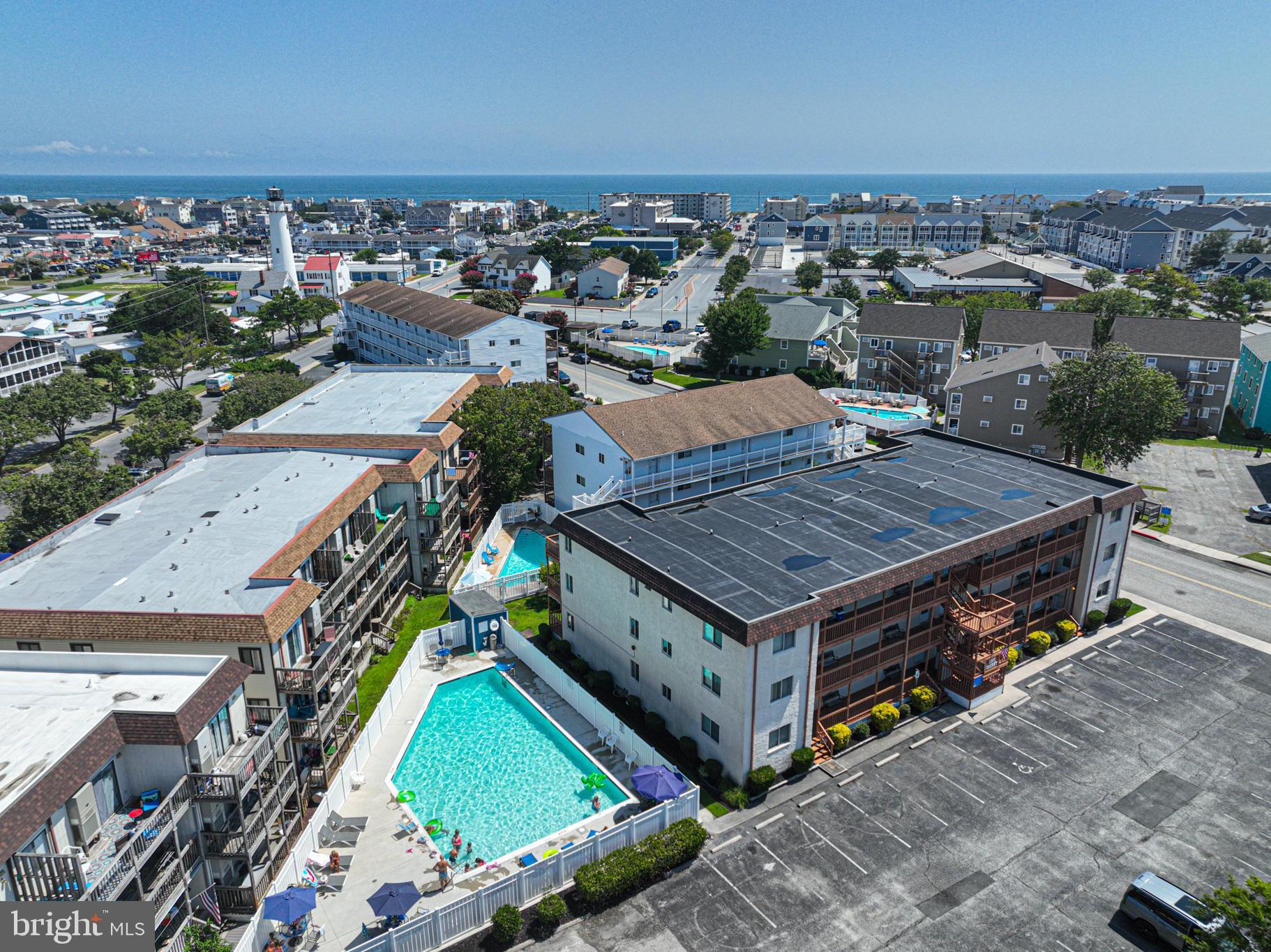 14405 Tunnel Avenue, Unit 112 Ocean City, MD 21842 - Photo 1 of 32 an aerial view of a house with a garden