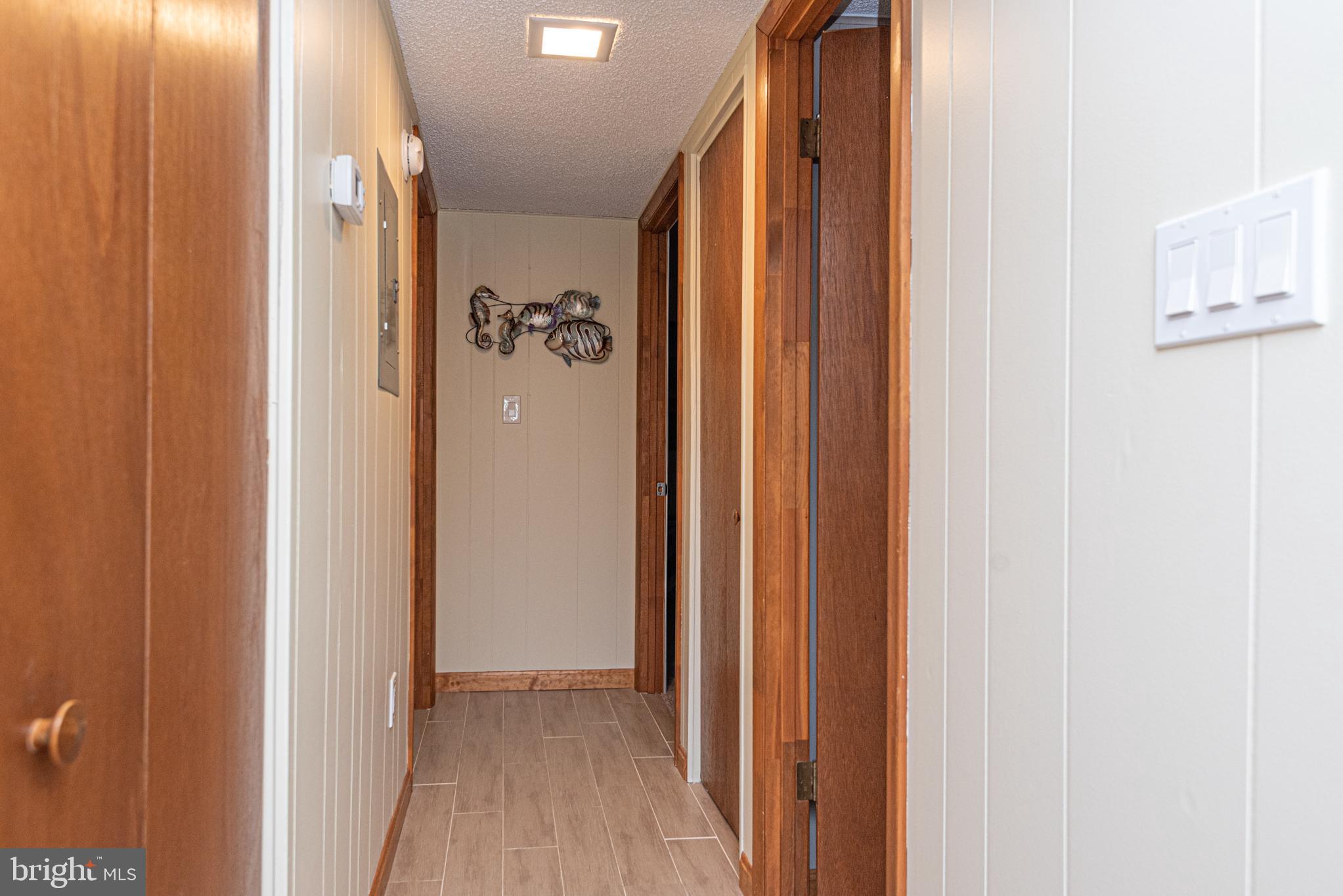 14405 Tunnel Avenue, Unit 112 Ocean City, MD 21842 - Photo 24 of 32 a view of a closet area