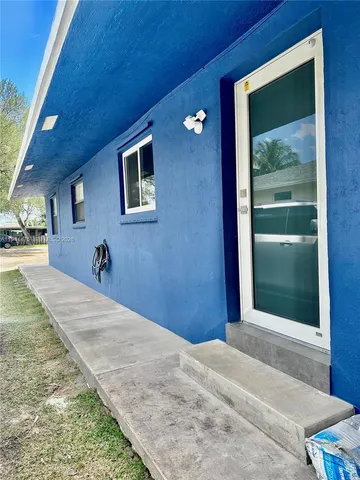 a view of a backyard of a house