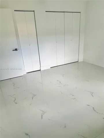 a view of a room with an empty space