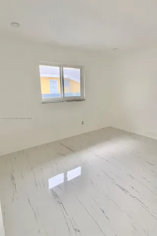 an empty room with a workbench