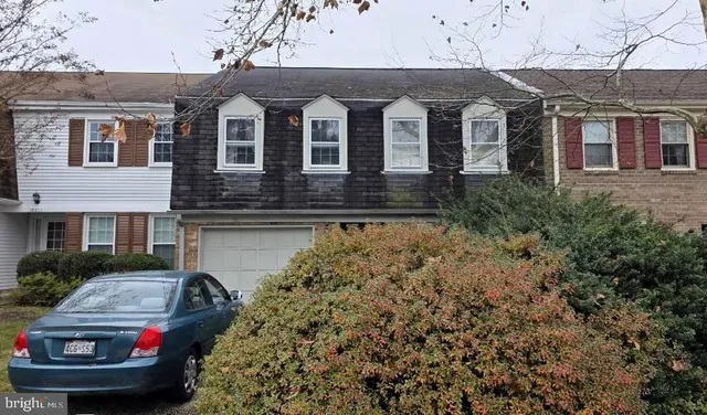 a front view of house with yard