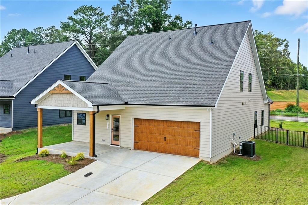 133 Old Alabama Road Southeast Emerson, GA 30137 - Photo 22 of 40 a view of a house with a yard and a porch