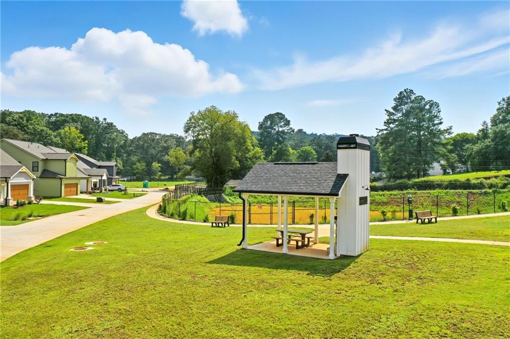 133 Old Alabama Road Southeast Emerson, GA 30137 - Photo 24 of 40 a view of an house with backyard and swimming pool