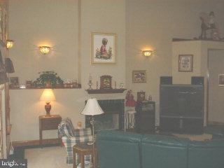 1523 Brunnerville Road Lititz, PA 17543 - Photo 3 of 10 a view of a dining room with furniture and a lake view