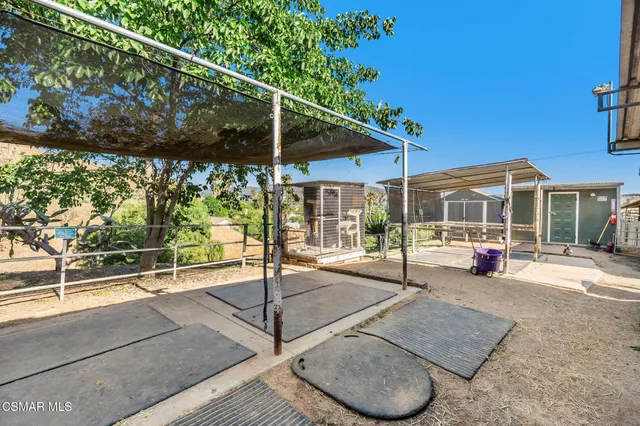 a view of a hall with wooden floor