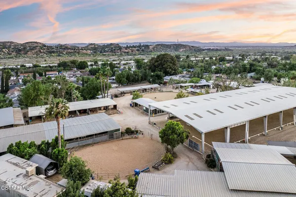 a view of a terrace with a garden and mountain view