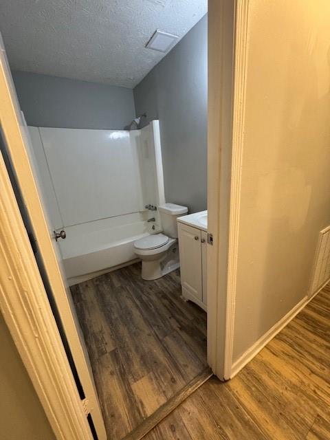 8327 Glenwoods Terrace, Unit A Riverdale, GA 30274 - Photo 3 of 9 a bathroom with a toilet and a shower