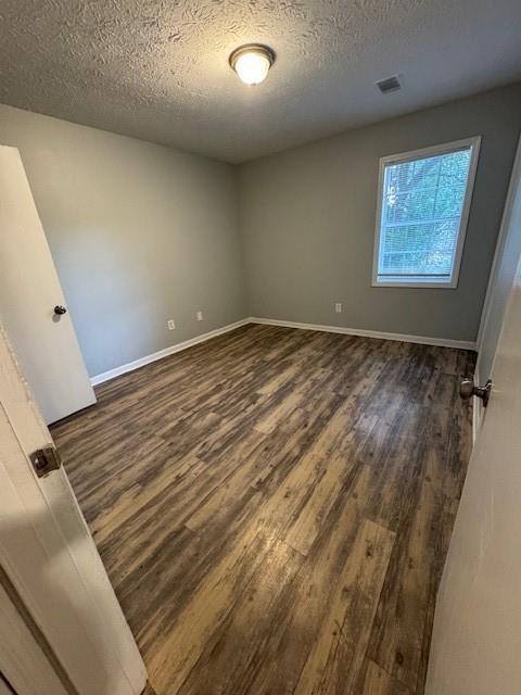 8327 Glenwoods Terrace, Unit A Riverdale, GA 30274 - Photo 4 of 9 en empty room with windows
