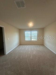 163 Redbud Road Palm Coast, FL 32137 - Photo 17 of 29 a view of an empty room with a window