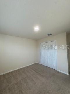 163 Redbud Road Palm Coast, FL 32137 - Photo 24 of 29 a view of an empty room