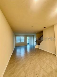 163 Redbud Road Palm Coast, FL 32137 - Photo 6 of 29 a view of a room with window
