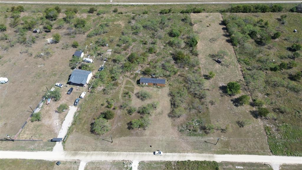 Lot 26 Baron Acres Road Wortham, TX 76693 - Photo 1 of 9 an aerial view of a houses with a yard