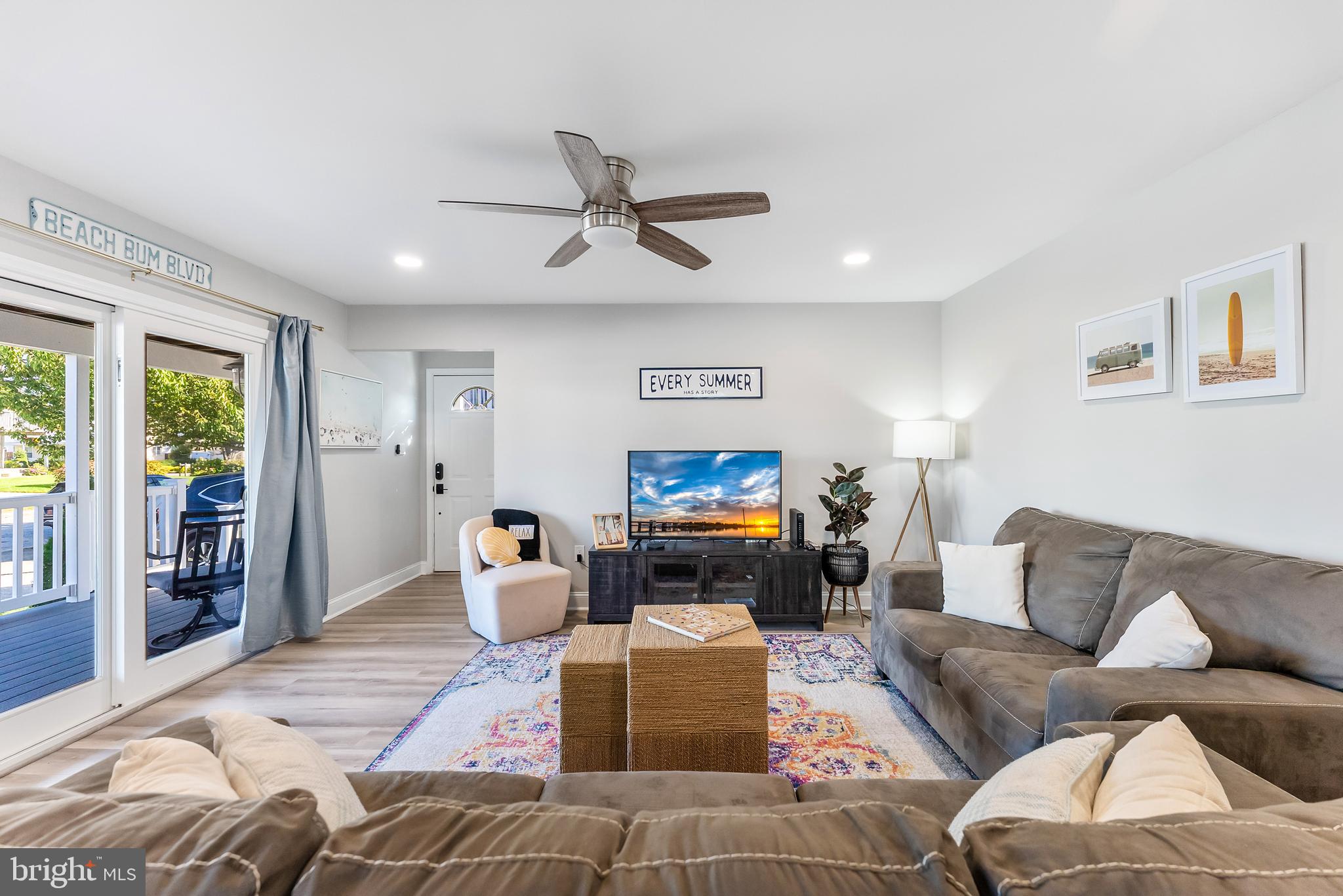 12 Lighthouse Drive, Unit A Brigantine, NJ 08203 - Photo 14 of 32 a living room with furniture and a couch