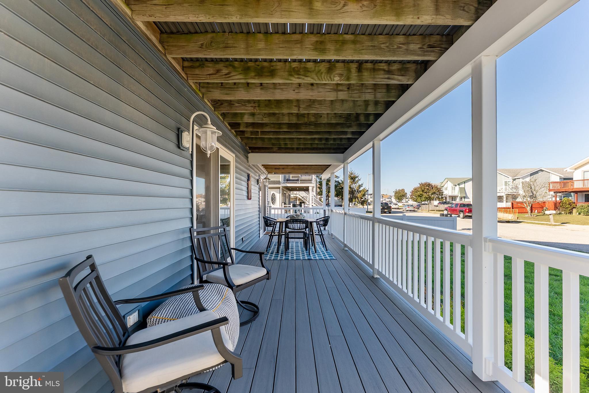 12 Lighthouse Drive, Unit A Brigantine, NJ 08203 - Photo 28 of 32 a view of a balcony with chairs