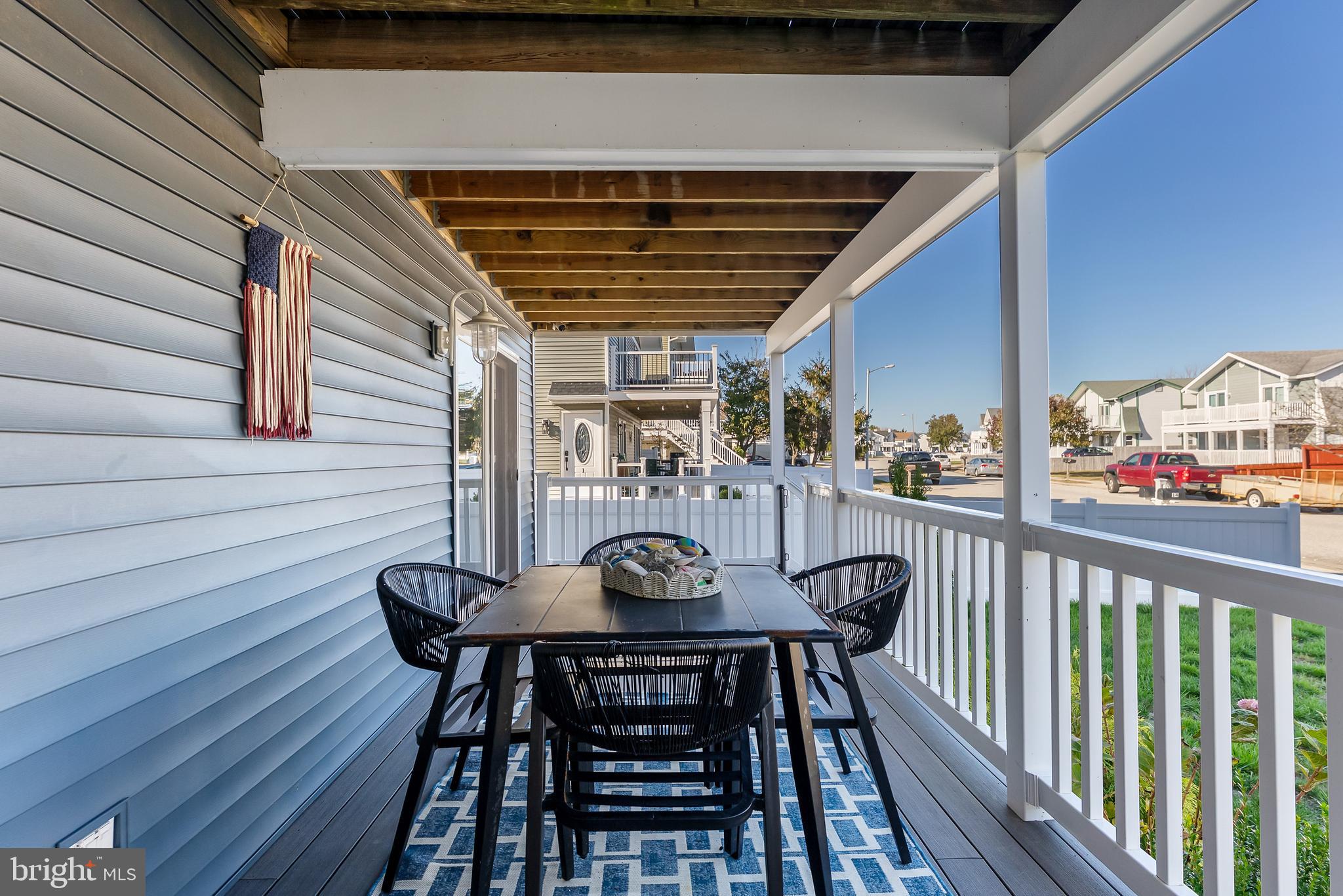 12 Lighthouse Drive, Unit A Brigantine, NJ 08203 - Photo 29 of 32 a view of a chairs and table in the balcony