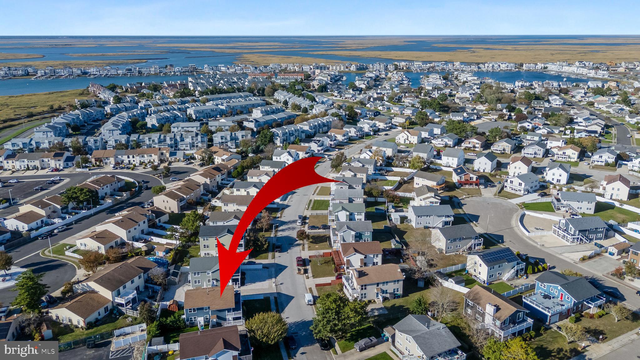 12 Lighthouse Drive, Unit A Brigantine, NJ 08203 - Photo 32 of 32 an aerial view of a city with lots of residential buildings and ocean view in back