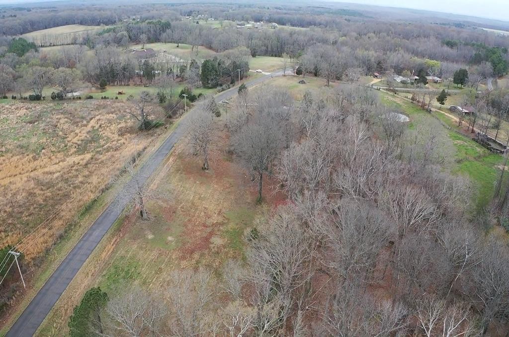 1486 Cedar Grove Road Big Sandy, TN 38221 - Photo 7 of 16 a view of a yard