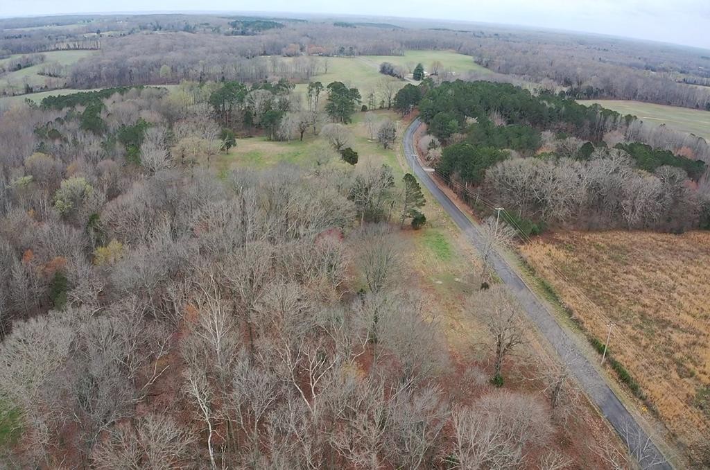 1486 Cedar Grove Road Big Sandy, TN 38221 - Photo 8 of 16 a view of a city with lush green forest