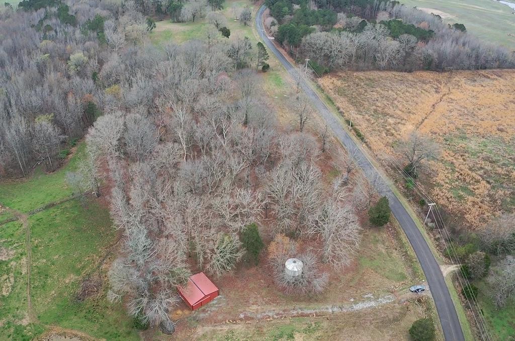 1486 Cedar Grove Road Big Sandy, TN 38221 - Photo 10 of 16 a backyard of a house