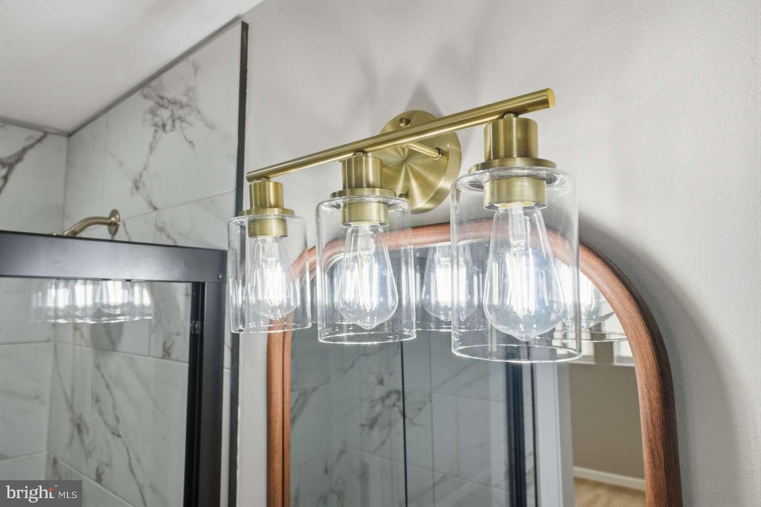 8653 Rugby Street Philadelphia, PA 19150 - Photo 26 of 45 a water heater on the side of a glass door