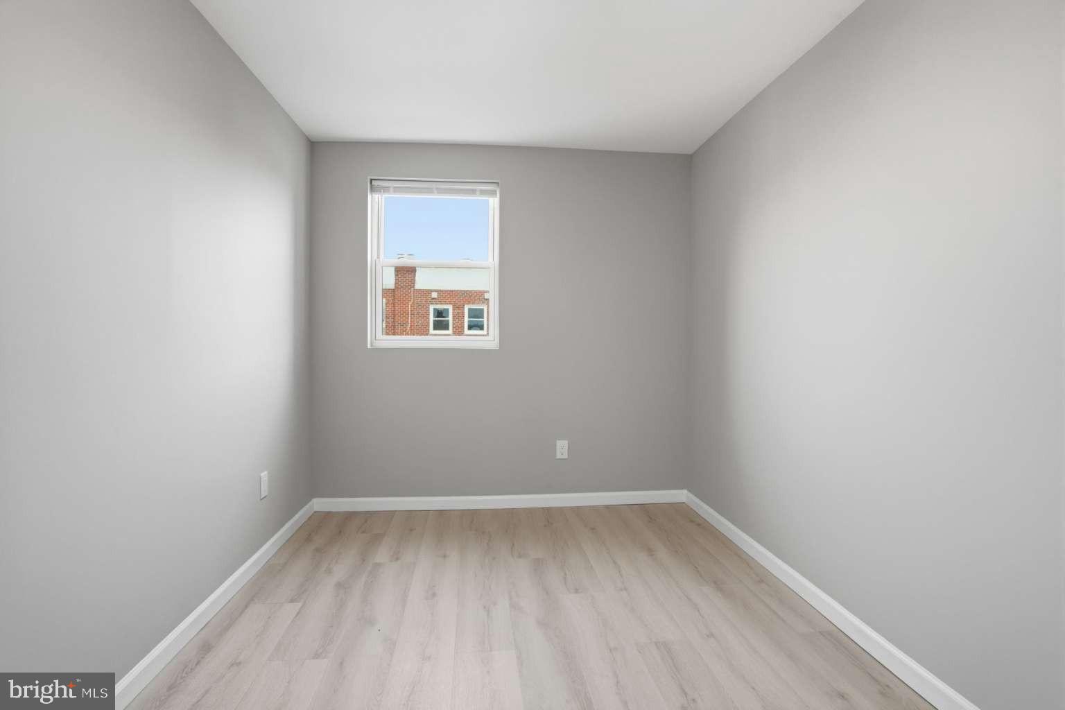 8653 Rugby Street Philadelphia, PA 19150 - Photo 29 of 45 a view of a small space with wooden floor and a window