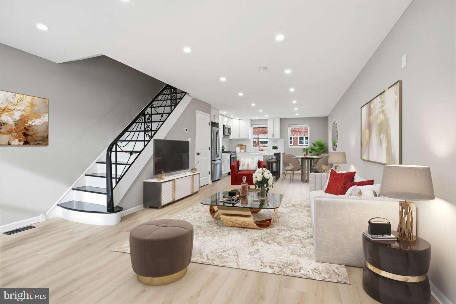 8653 Rugby Street Philadelphia, PA 19150 - Photo 3 of 45 a living room with furniture and wooden floor