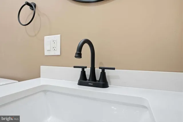 a close view of utility room with washer and dryer
