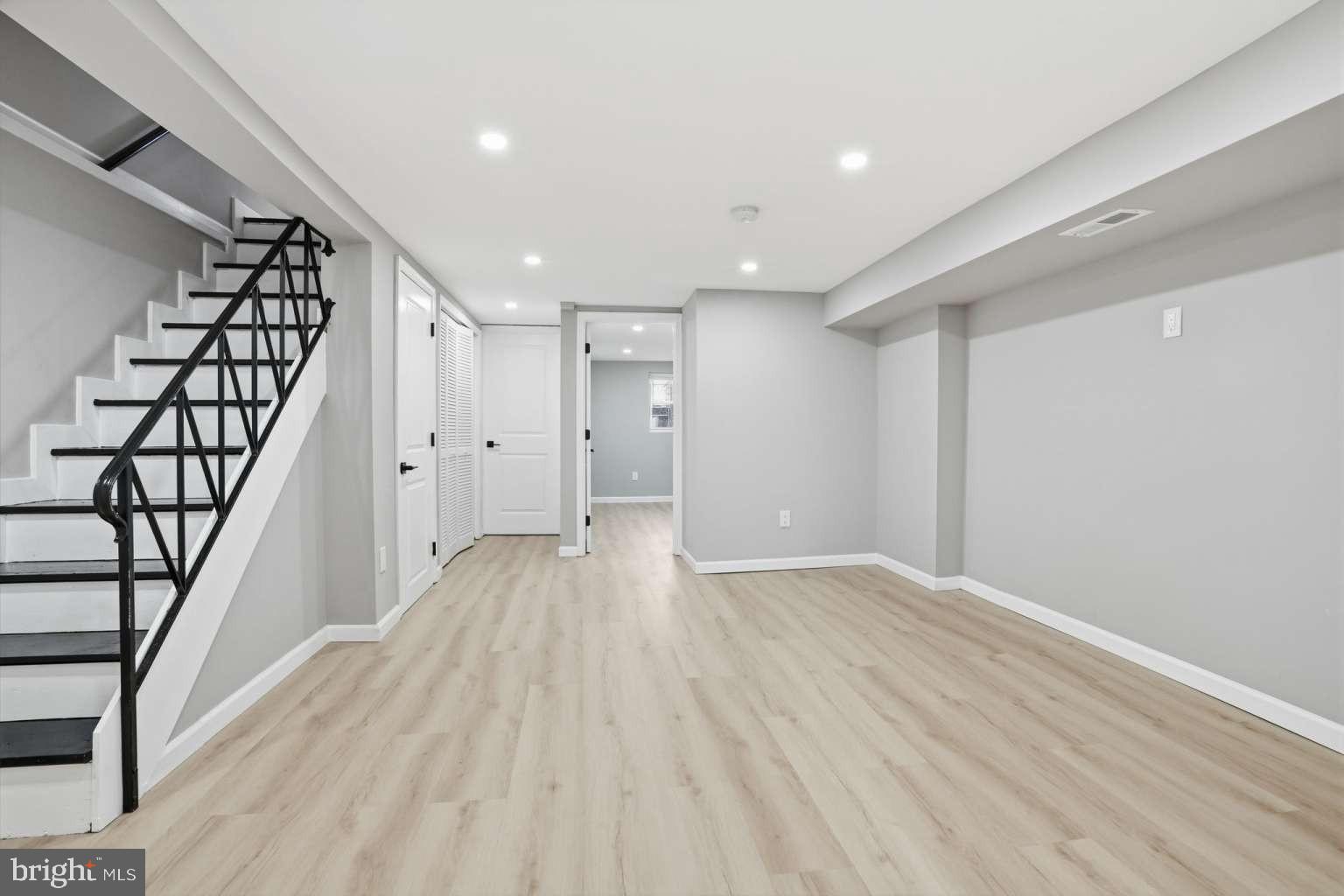 8653 Rugby Street Philadelphia, PA 19150 - Photo 34 of 45 wooden floor in an empty room with a window
