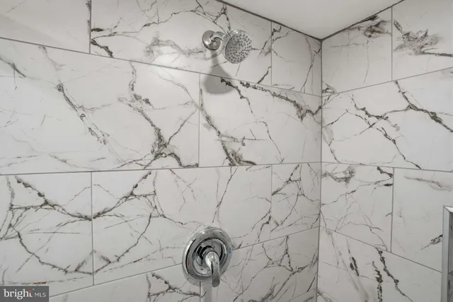 a bathroom with a sink a toilet and vanity