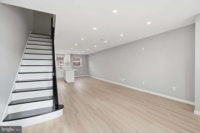 a view of entryway with wooden floor