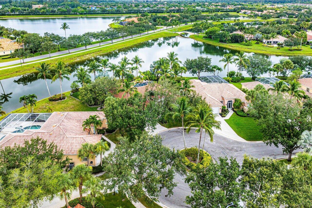 7580 Red River Road West Palm Beach, FL 33411 - Photo 45 of 69 an aerial view of a house with a garden and lake view