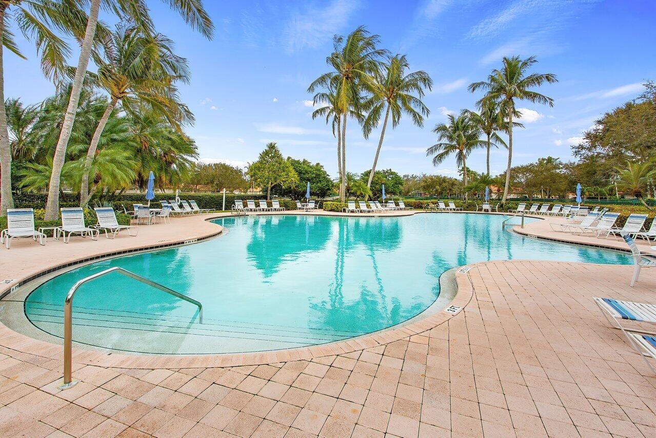 7580 Red River Road West Palm Beach, FL 33411 - Photo 66 of 69 a view of a lake with palm trees