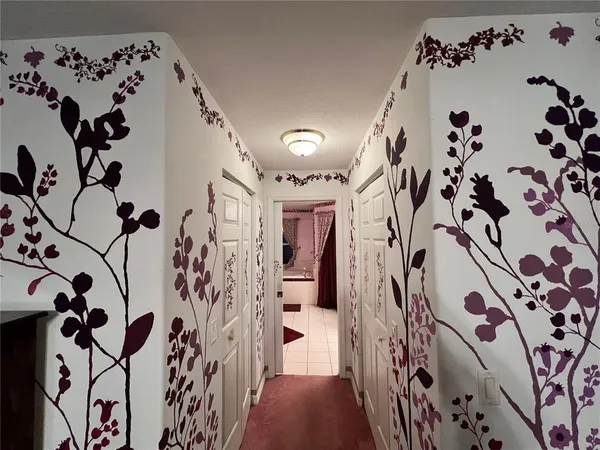a bathroom with a bathtub and shower curtain