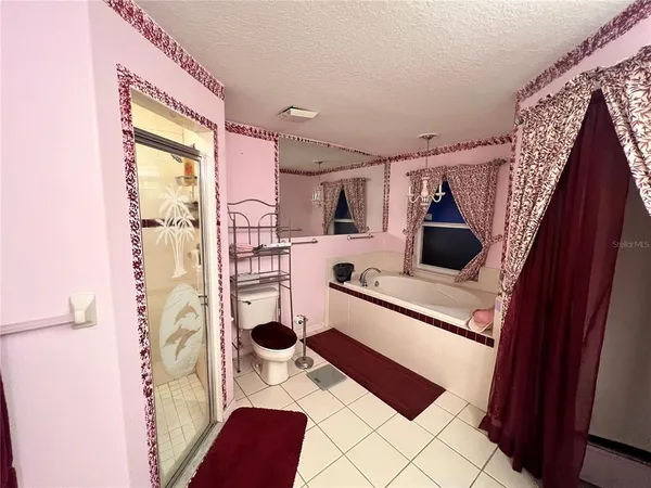 a kitchen with a sink refrigerator and microwave