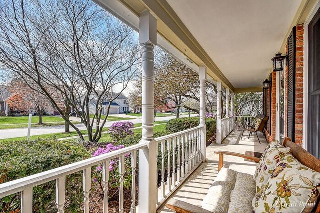 2107 Wicklow Road Naperville, IL 60564 - Photo 2 of 27 a view of a porch with a backyard