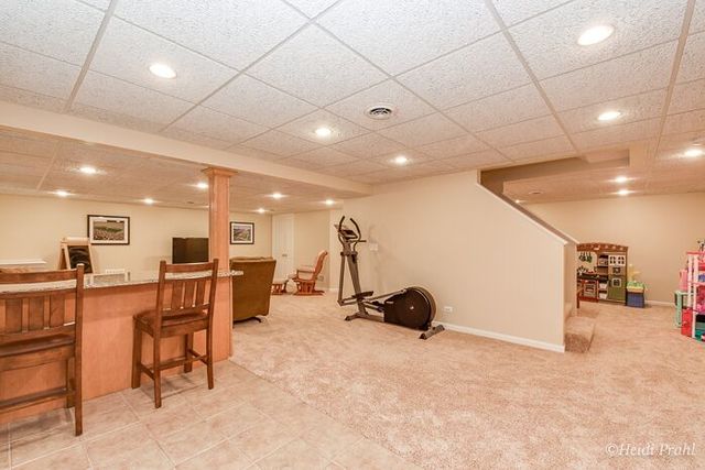 2107 Wicklow Road Naperville, IL 60564 - Photo 23 of 27 a view of a room with gym equipment