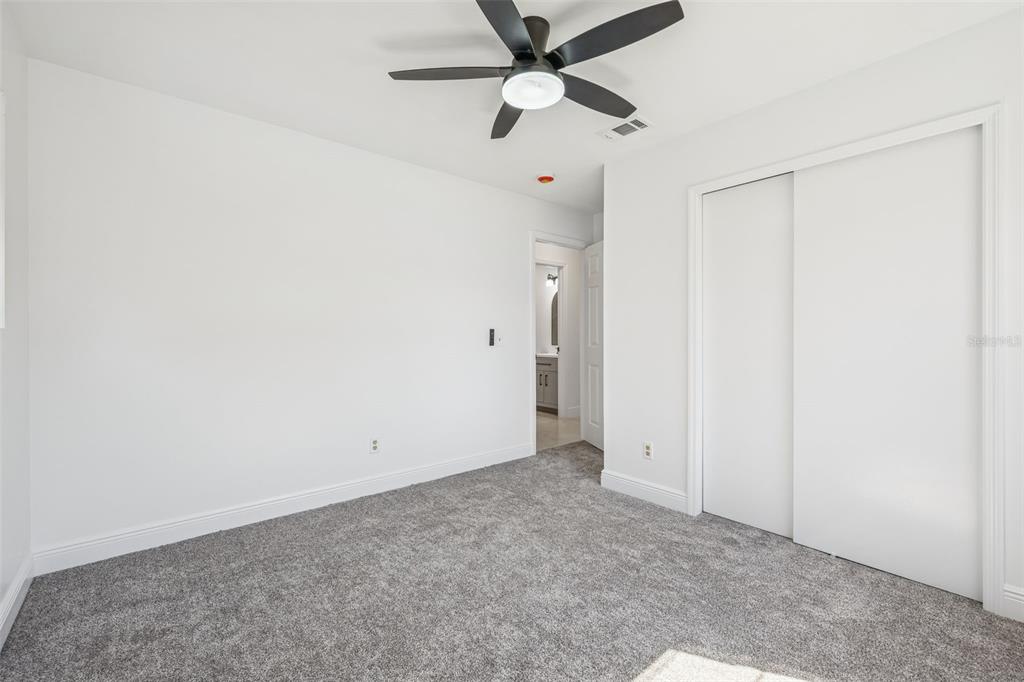 314 Wurst Road Ocoee, FL 34761 - Photo 15 of 35 an empty room with a ceiling fan and a window