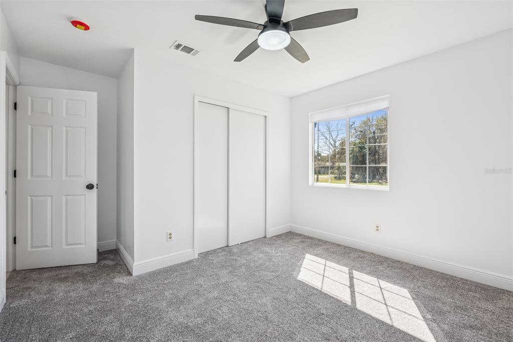 314 Wurst Road Ocoee, FL 34761 - Photo 19 of 35 a view of an empty room with a window