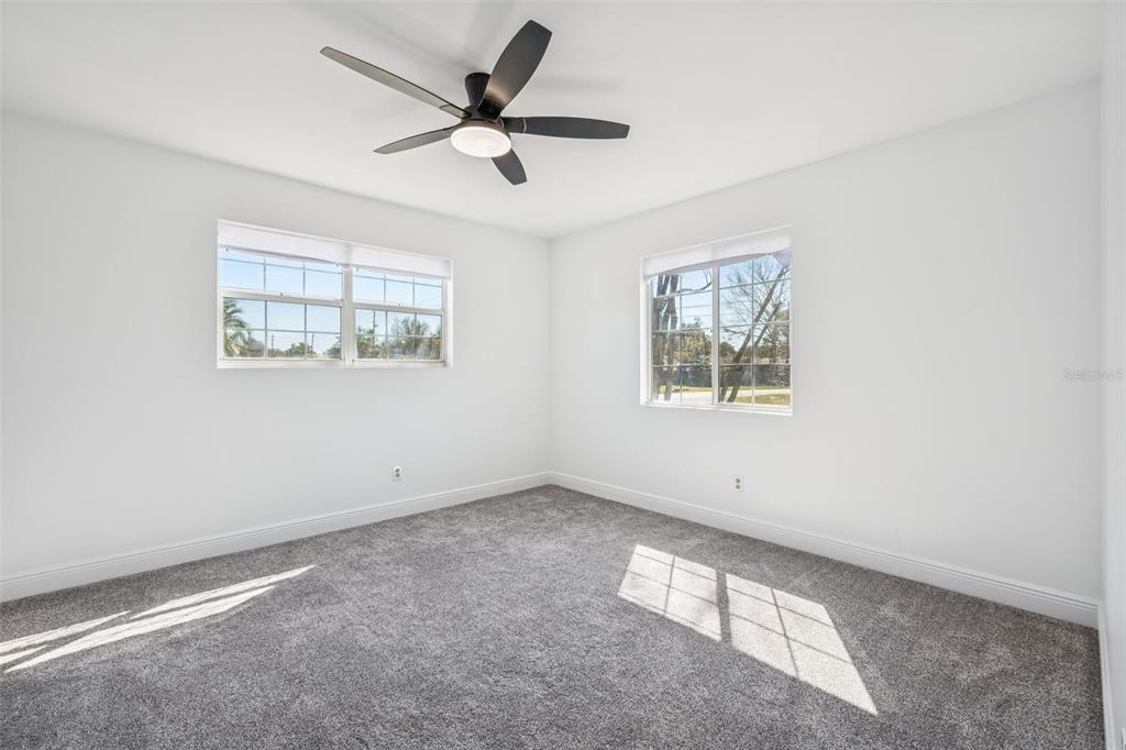 314 Wurst Road Ocoee, FL 34761 - Photo 21 of 35 wooden floor in an empty room with a window