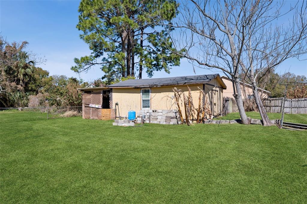 314 Wurst Road Ocoee, FL 34761 - Photo 35 of 35 a view of a house with a backyard