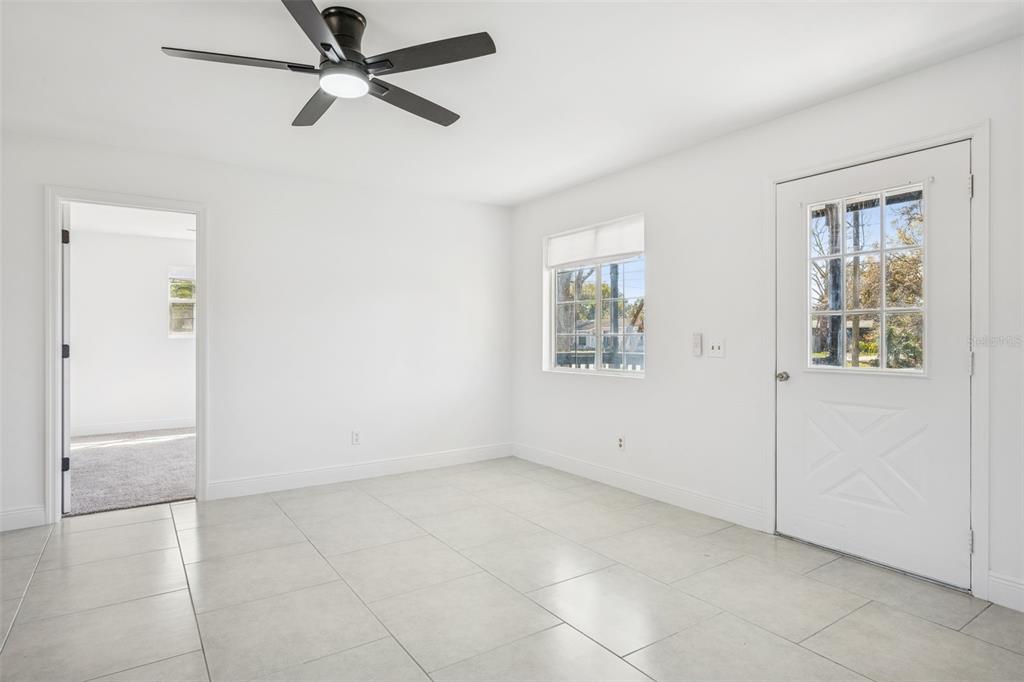 314 Wurst Road Ocoee, FL 34761 - Photo 6 of 35 a view of an empty room with a window