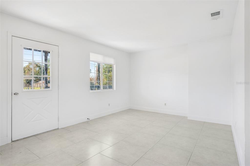 314 Wurst Road Ocoee, FL 34761 - Photo 7 of 35 an empty room with windows