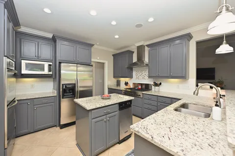 a room with furniture a book shelf and a book shelf